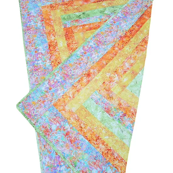 Seeing Double Reversible Throw Quilts Bag Pattern by Aunties Two - Completed quilt on pattern cover