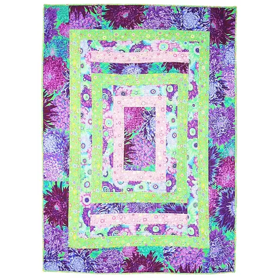 Seeing Double Reversible Throw Quilts Bag Pattern by Aunties Two - Completed quilt in purples and greens