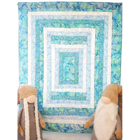 Seeing Double Reversible Throw Quilts Bag Pattern by Aunties Two - Completed quilt in blues and white