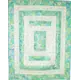 Seeing Double Reversible Throw Quilts Bag Pattern by Aunties Two - completed quilt in green and white